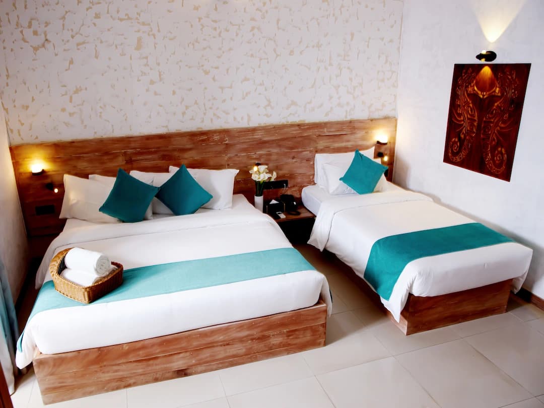 Deluxe Room beds and decor