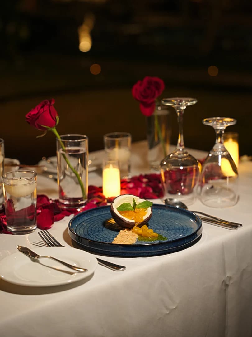 Elegantly decorated dinner table with fine dining arrangements